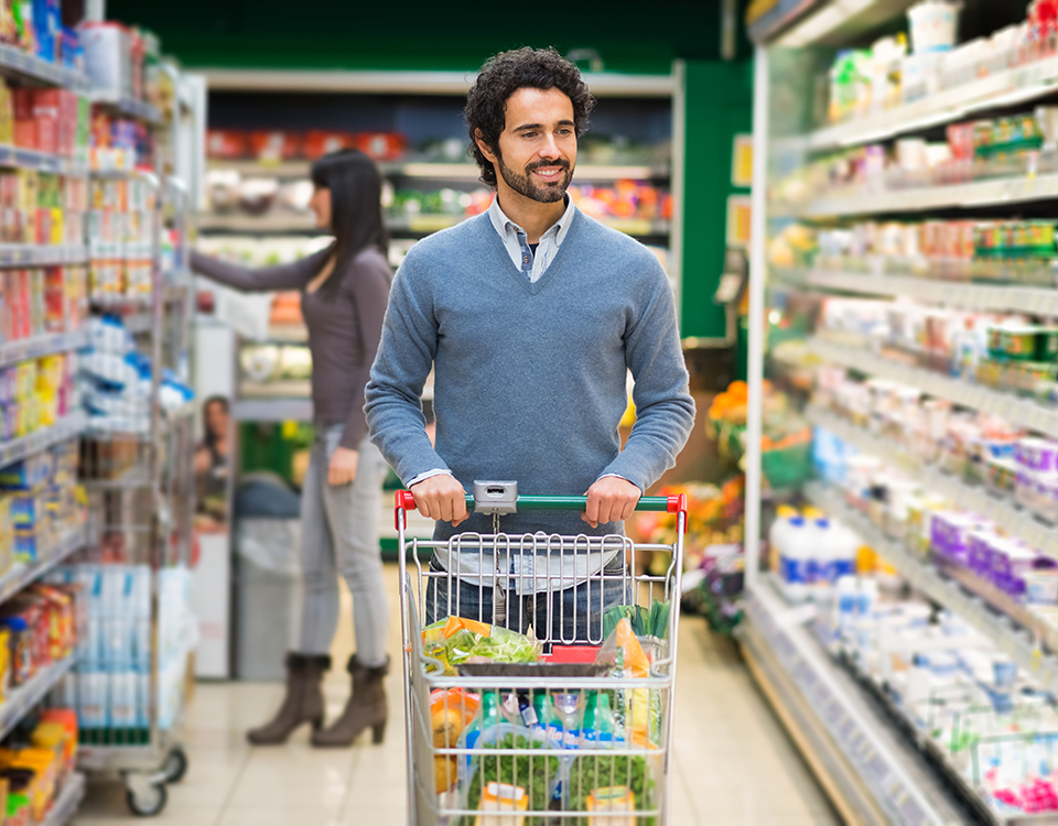 Man driving a shopping cart